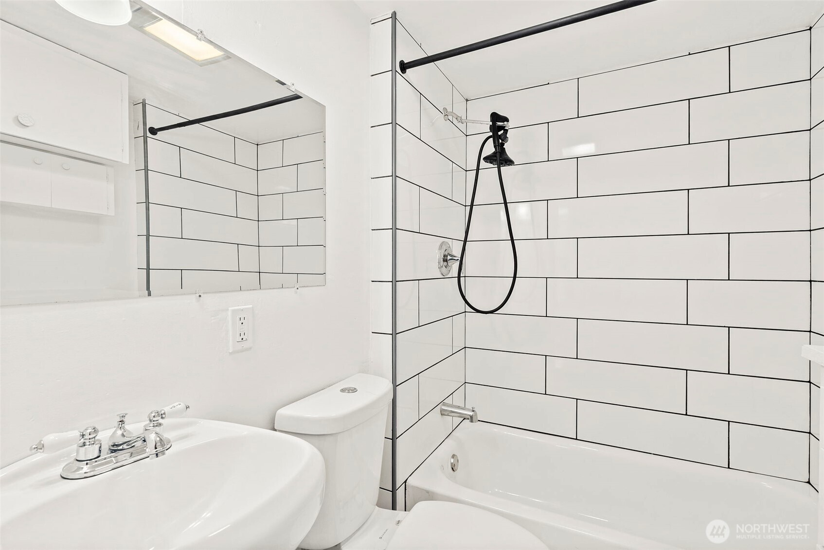 409 South 30th Street Tacoma, WA 98402 - Photo 34 of 37 a bathroom with a sink toilet and shower
