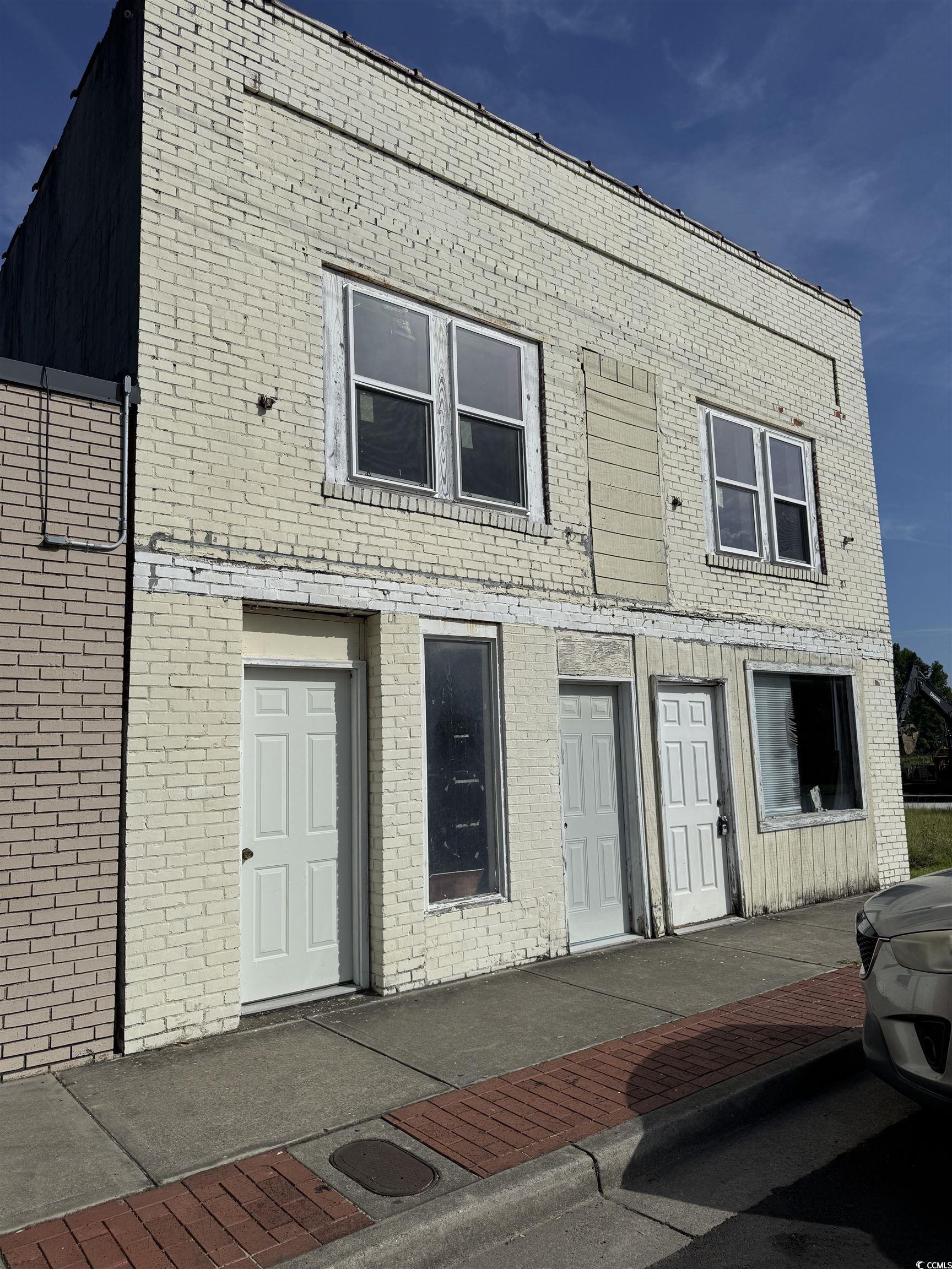 4211 Meeting Street Loris, SC 29569 - Photo 1 of 22 View of front of property featuring brick siding