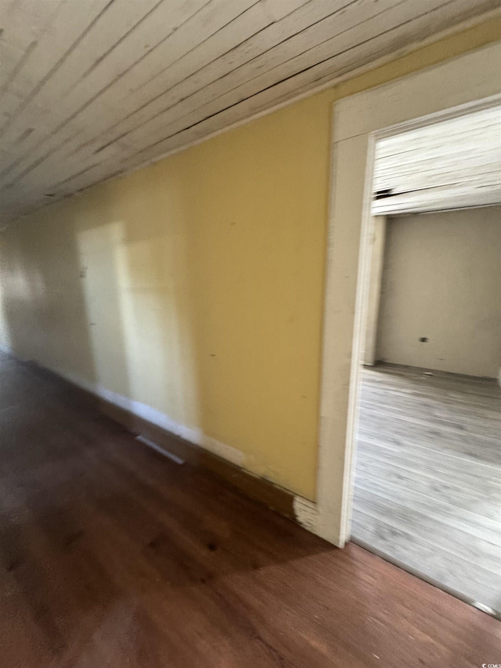4211 Meeting Street Loris, SC 29569 - Photo 12 of 22 Hall featuring dark wood-style floors