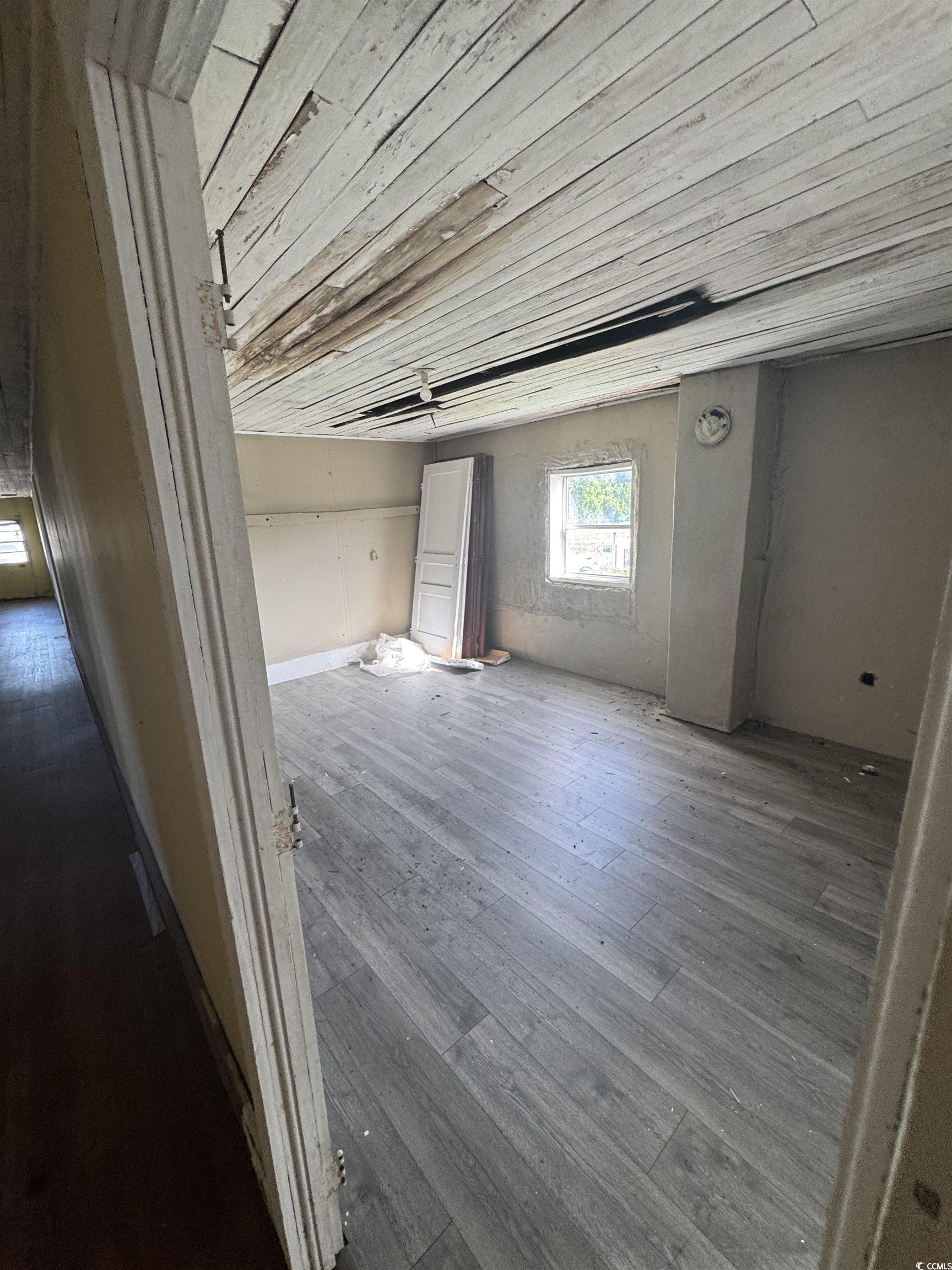 4211 Meeting Street Loris, SC 29569 - Photo 14 of 22 Interior space with wood finished floors