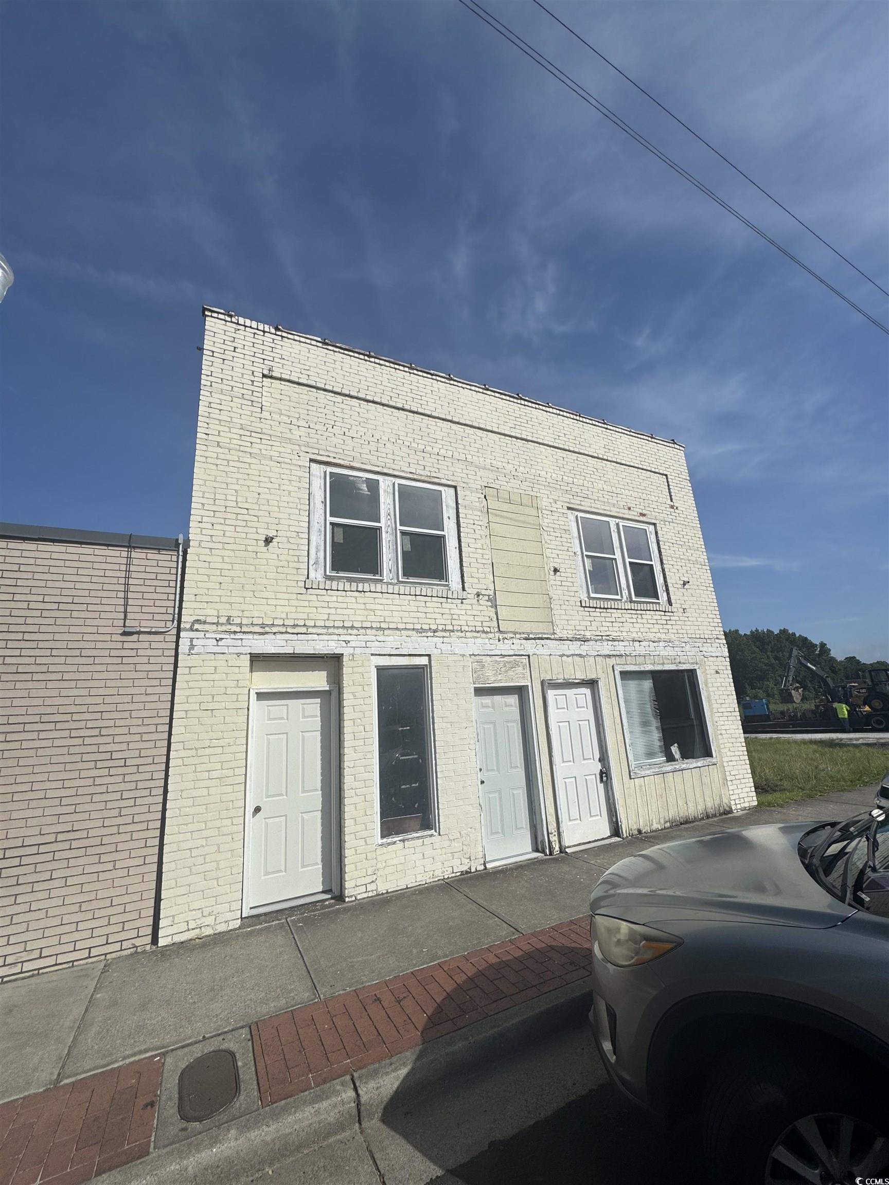 4211 Meeting Street Loris, SC 29569 - Photo 2 of 22 View of front of home with brick siding