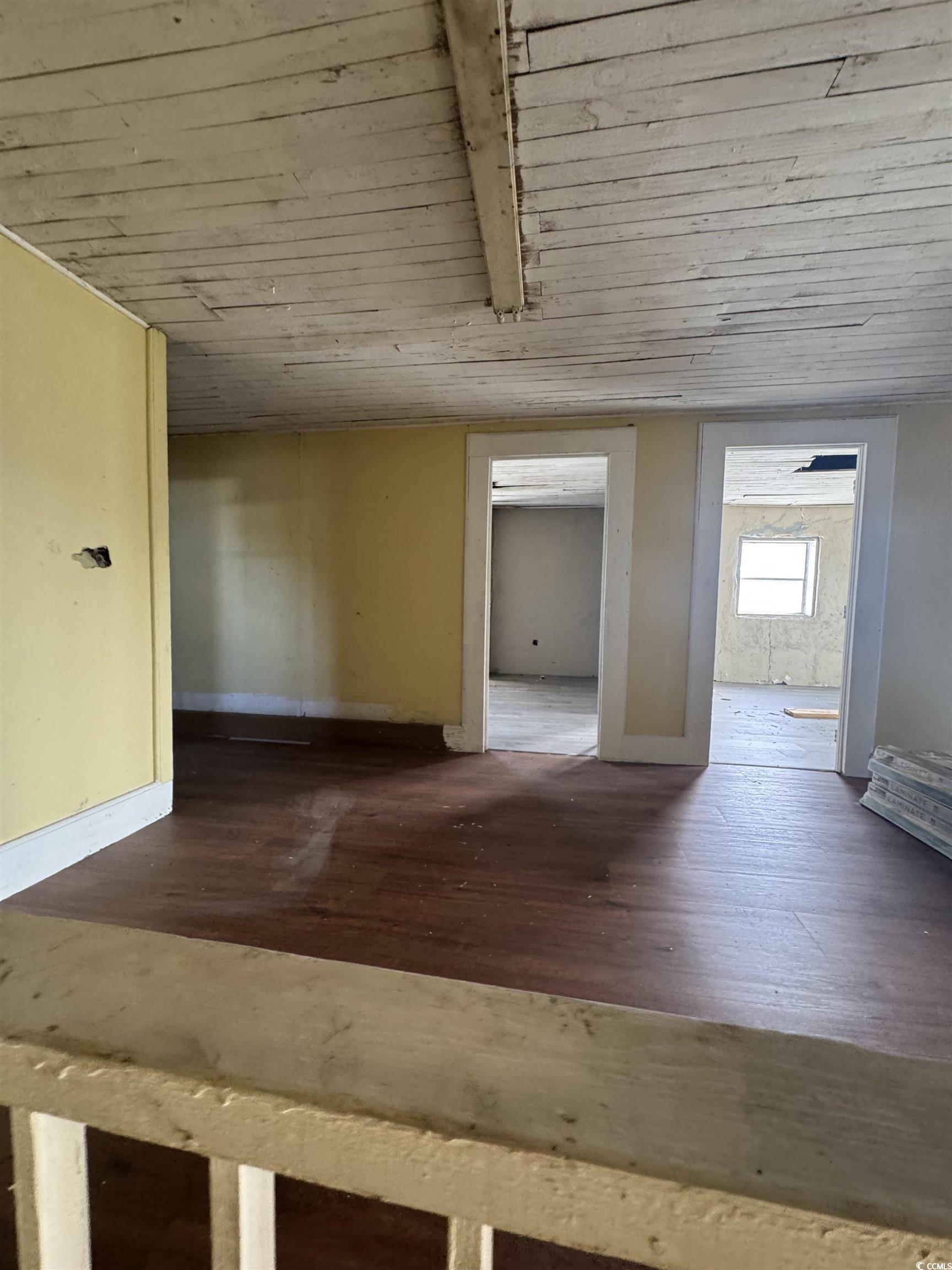 4211 Meeting Street Loris, SC 29569 - Photo 9 of 22 Corridor featuring dark wood finished floors