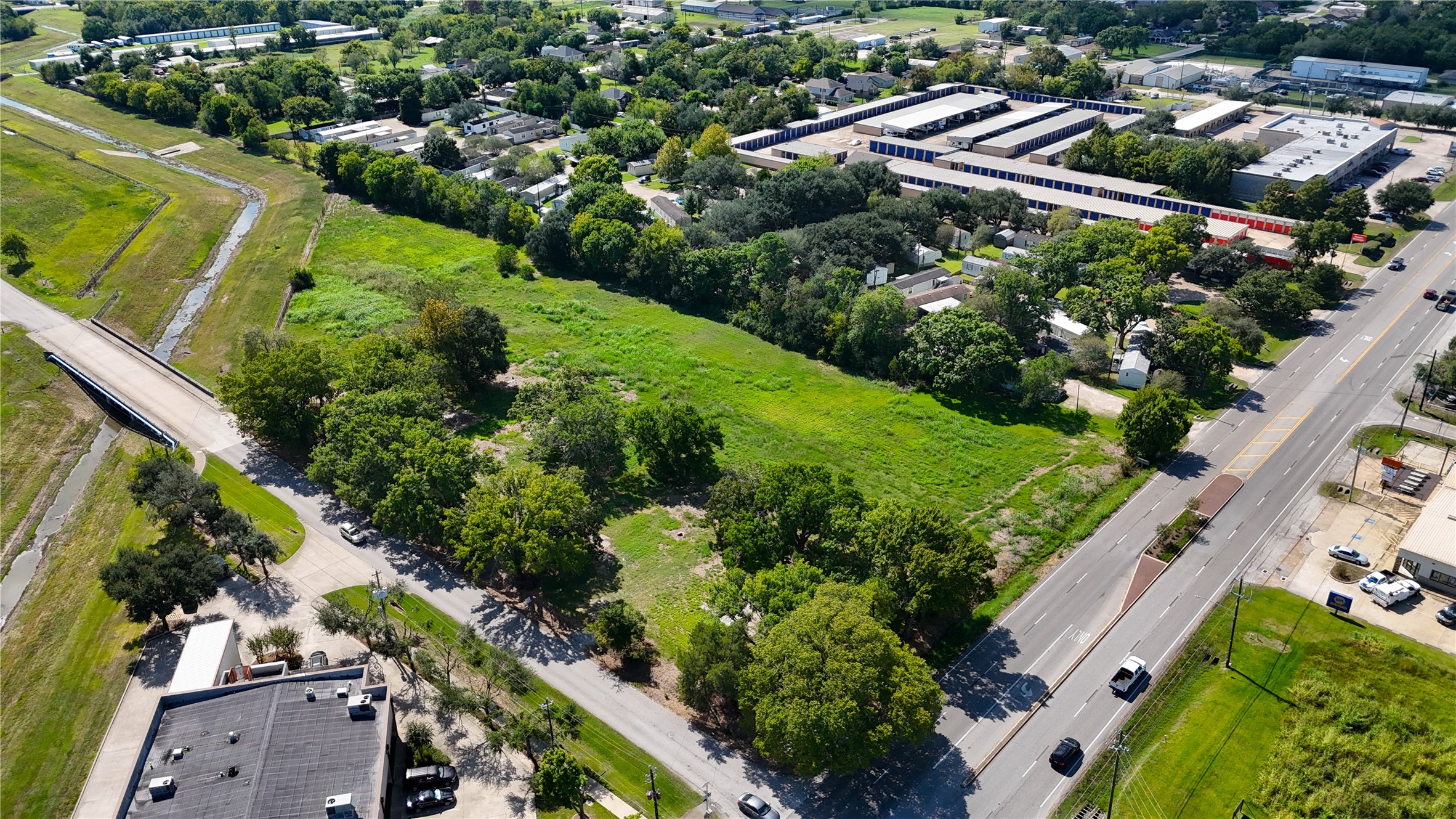 5604 Broadway Street Pearland, TX 77581 - Photo 7 of 8 an aerial view of residential houses with outdoor space