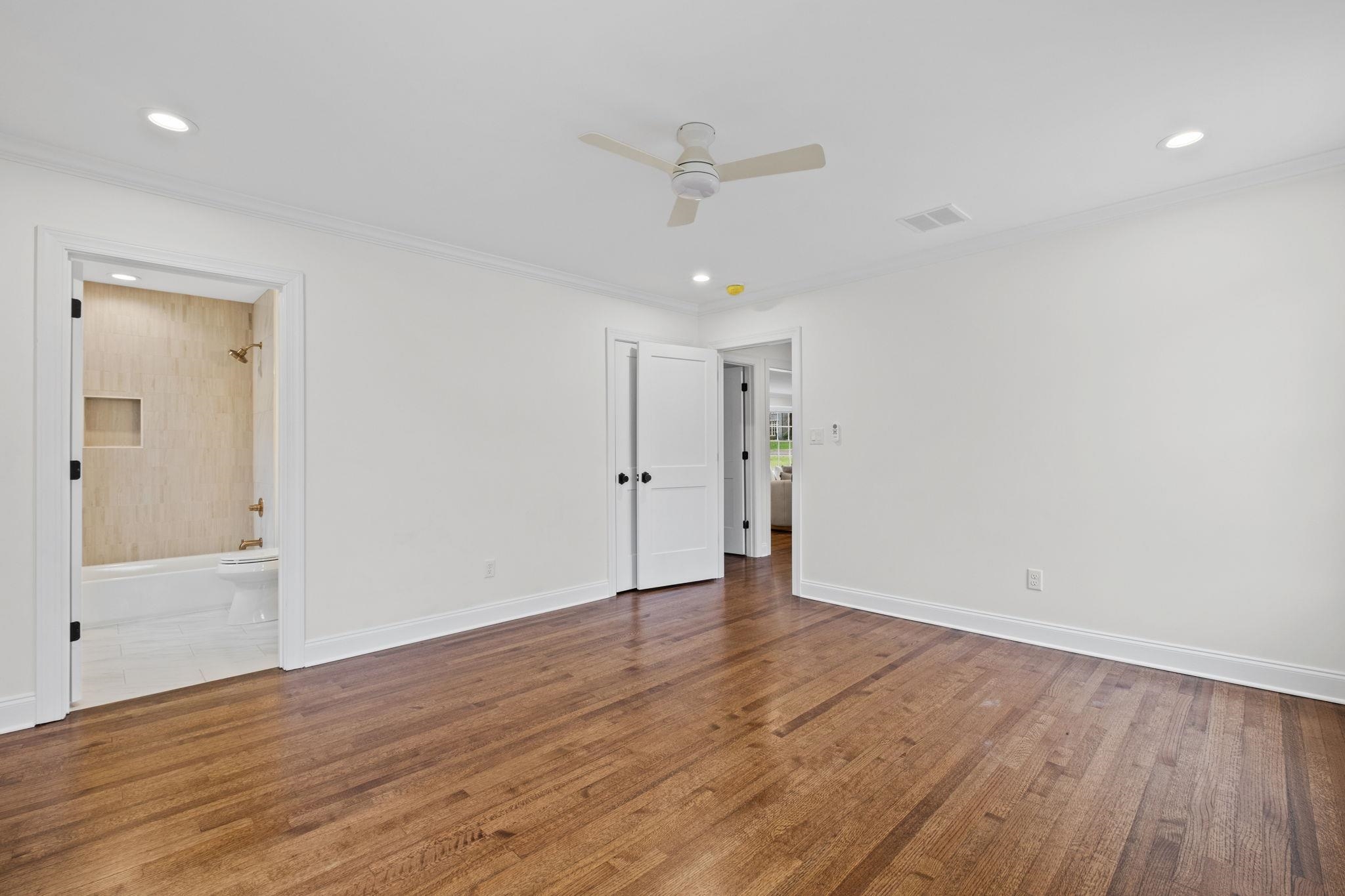 59 Devon Way Memphis, TN 38111 - Photo 26 of 40 wooden floor in an empty room with a window