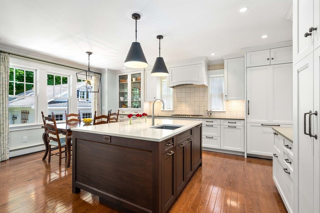 29 Royce Road Newton, MA 02459 - Photo 11 of 38 a kitchen with granite countertop a sink appliances and cabinets