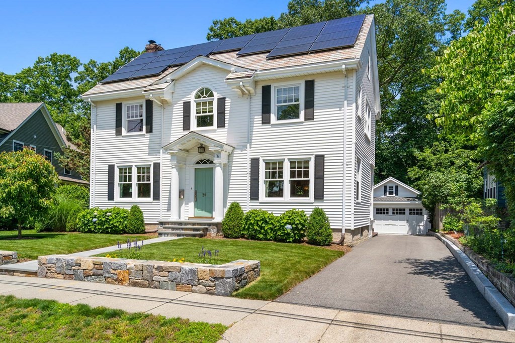 29 Royce Road Newton, MA 02459 - Photo 2 of 38 a front view of a house with a yard