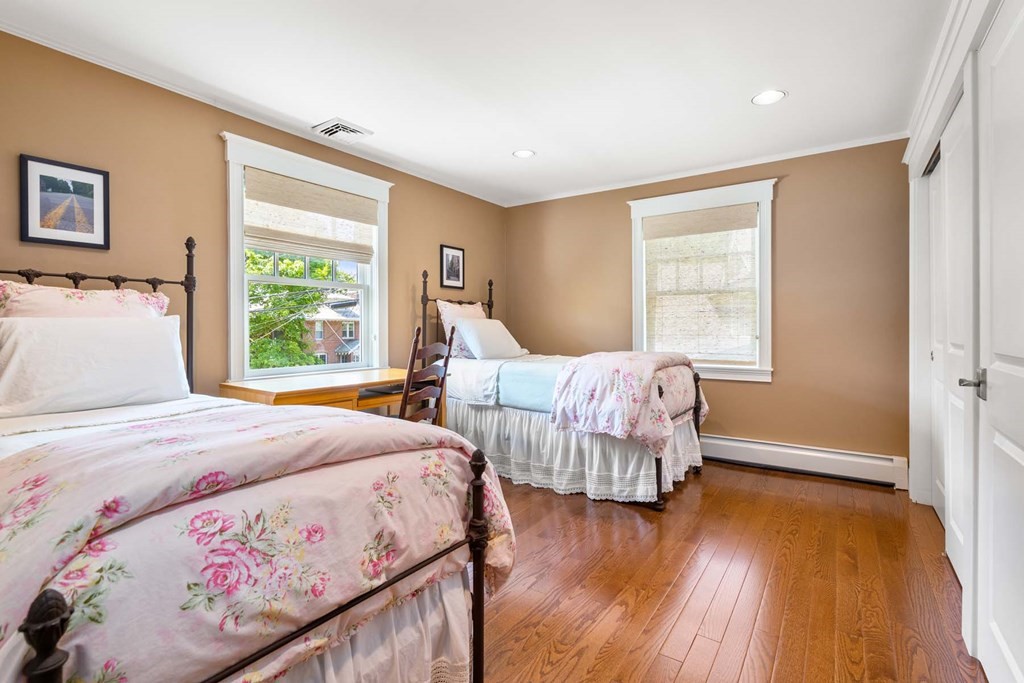 29 Royce Road Newton, MA 02459 - Photo 23 of 38 a bedroom with two beds and wooden floor