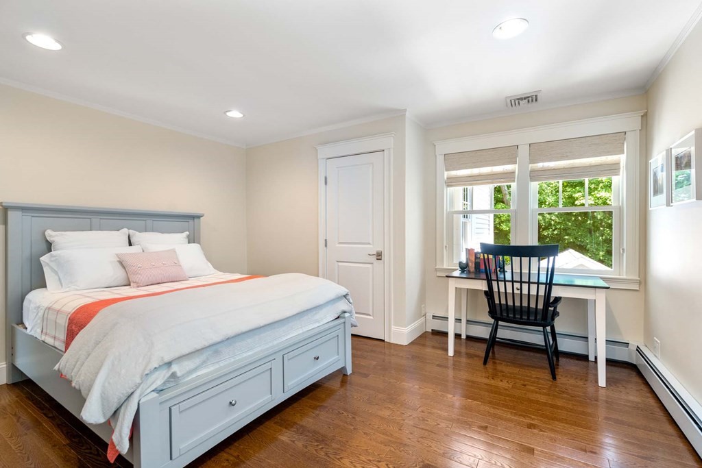 29 Royce Road Newton, MA 02459 - Photo 25 of 38 a bedroom with a bed and a view of bedroom