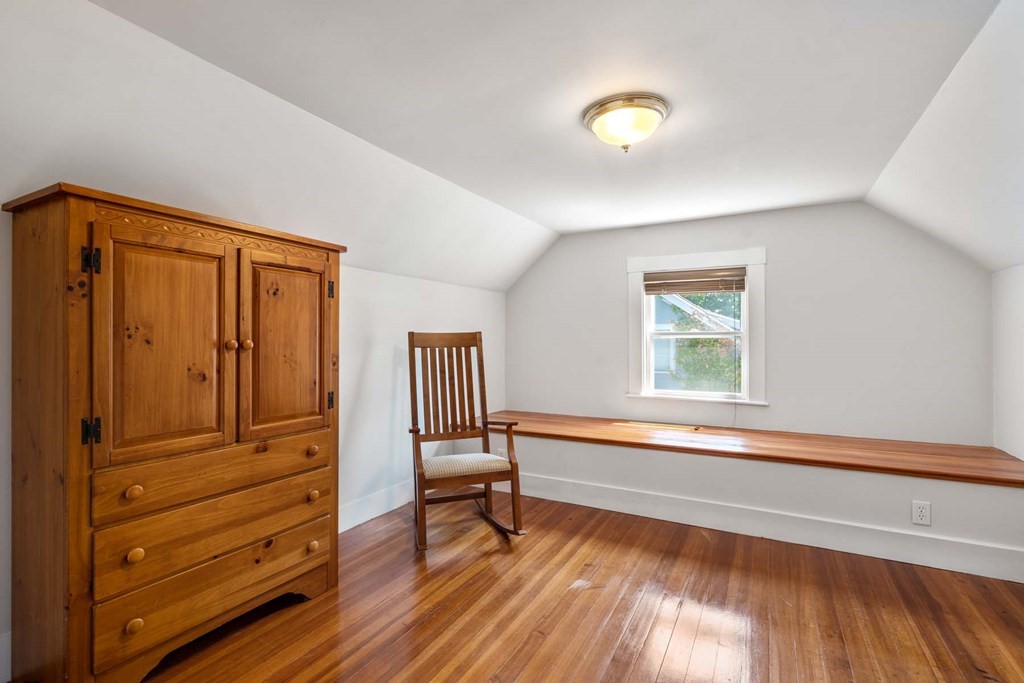 29 Royce Road Newton, MA 02459 - Photo 27 of 38 a living room with furniture and a window