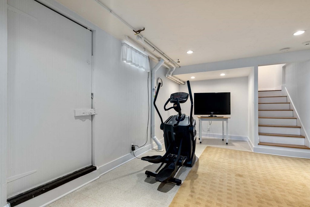 29 Royce Road Newton, MA 02459 - Photo 30 of 38 a view of a room with gym equipment