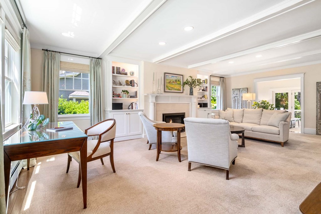 29 Royce Road Newton, MA 02459 - Photo 7 of 38 a living room with furniture and a fireplace