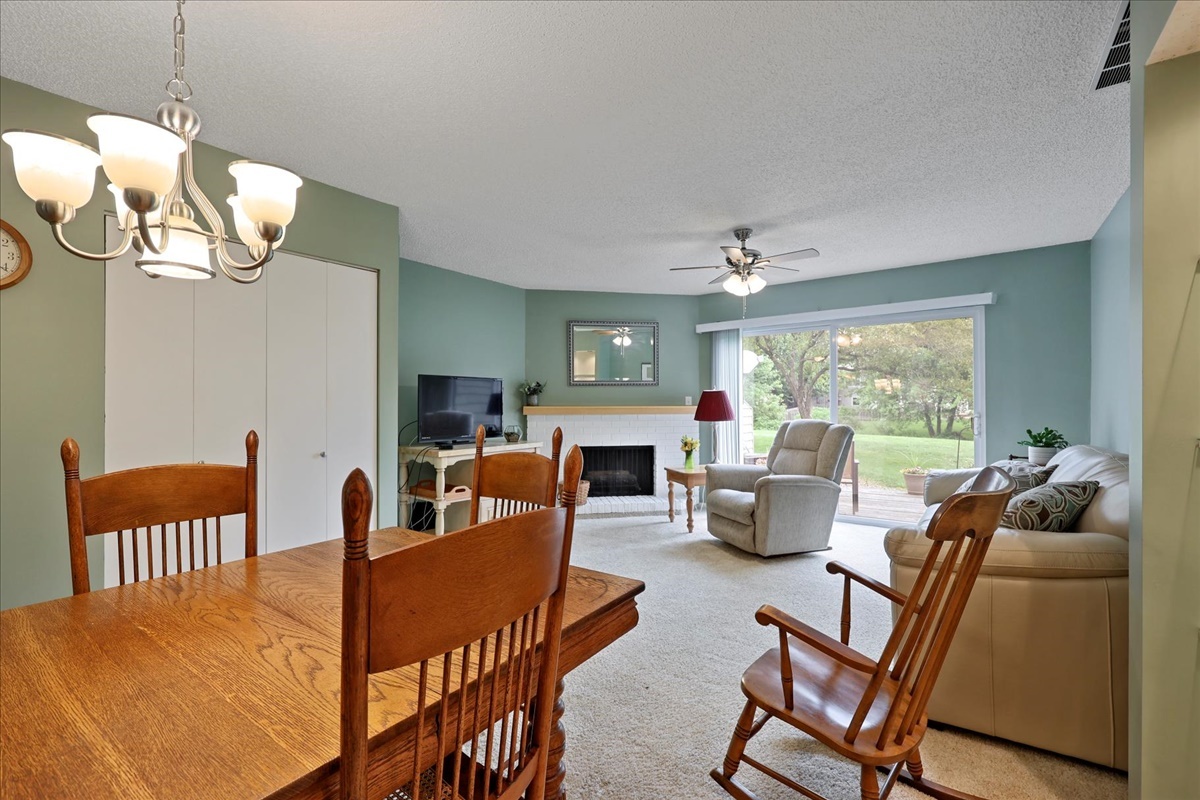 2004 Blackthorn Drive Champaign, IL 61821 - Photo 12 of 24 a living room with fireplace furniture and a large window