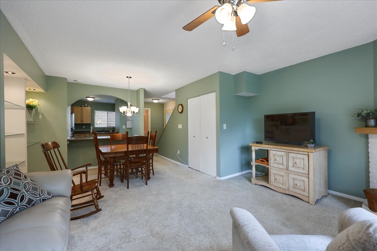 2004 Blackthorn Drive Champaign, IL 61821 - Photo 15 of 24 a living room with furniture and a flat screen tv