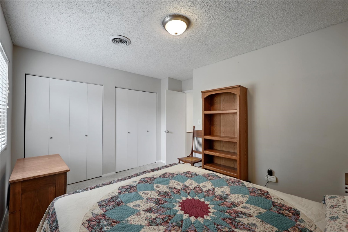 2004 Blackthorn Drive Champaign, IL 61821 - Photo 22 of 24 a bedroom with a bed and a window