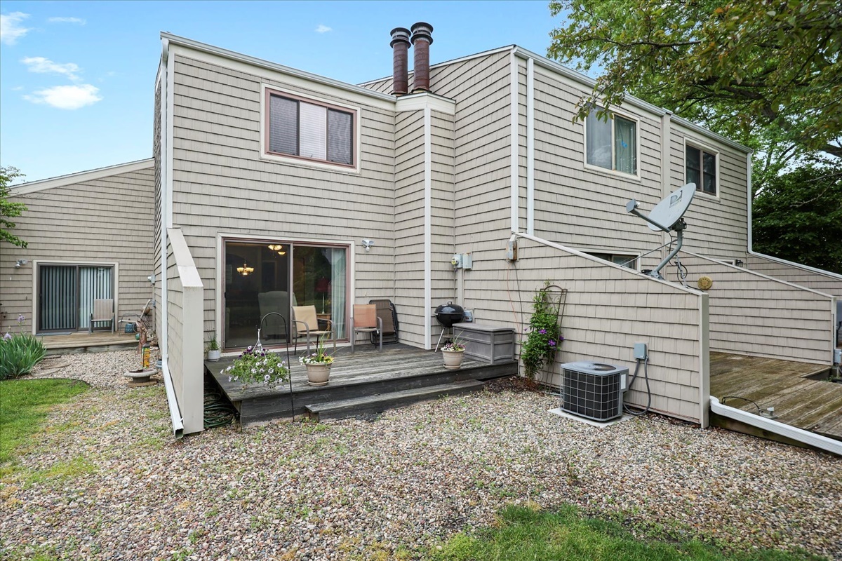 2004 Blackthorn Drive Champaign, IL 61821 - Photo 4 of 24 a view of house with a patio and a yard