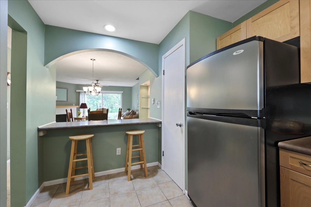2004 Blackthorn Drive Champaign, IL 61821 - Photo 10 of 24 a kitchen with a refrigerator and a sink