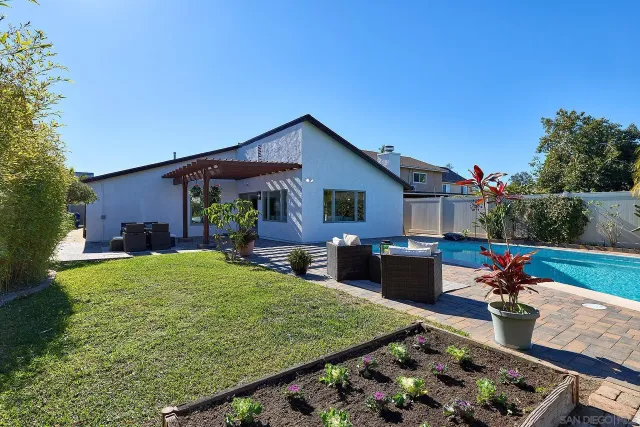 a view of a backyard and a patio