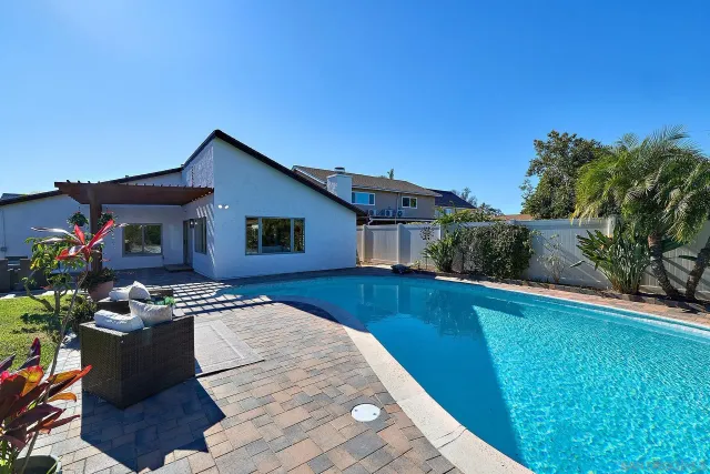 a view of a house with swimming pool