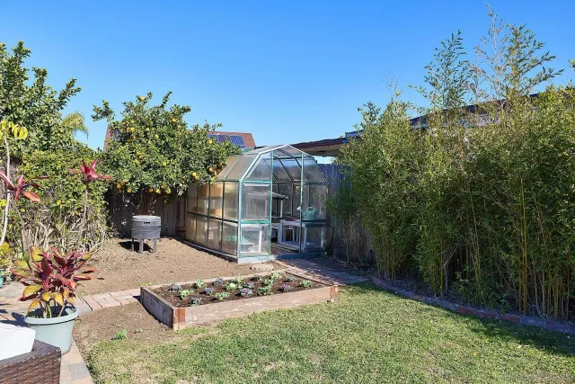 a garden view with a seating space