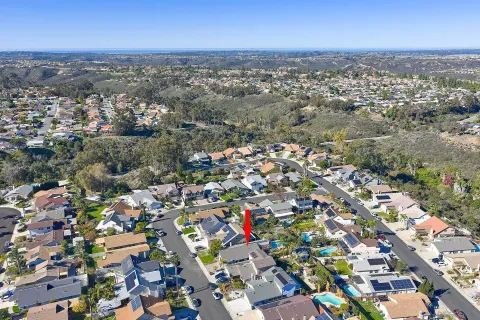 an aerial view of a city with lots of residential buildings