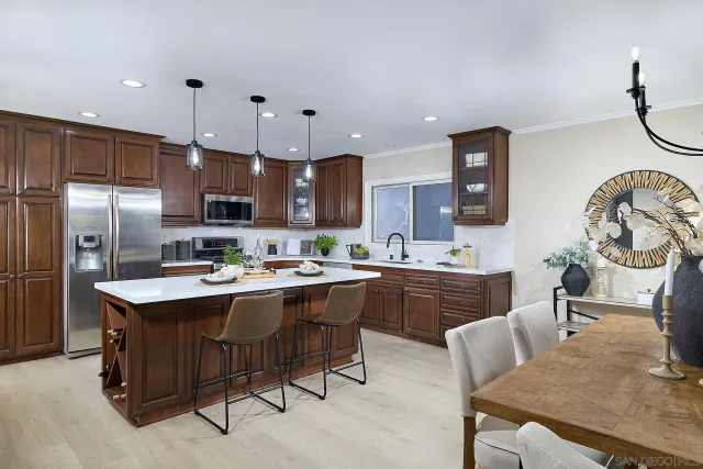 a kitchen with sink cabinets and window