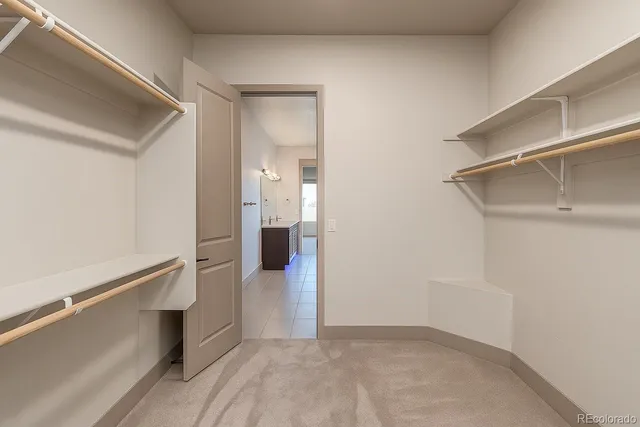 a view of an empty walk in closet