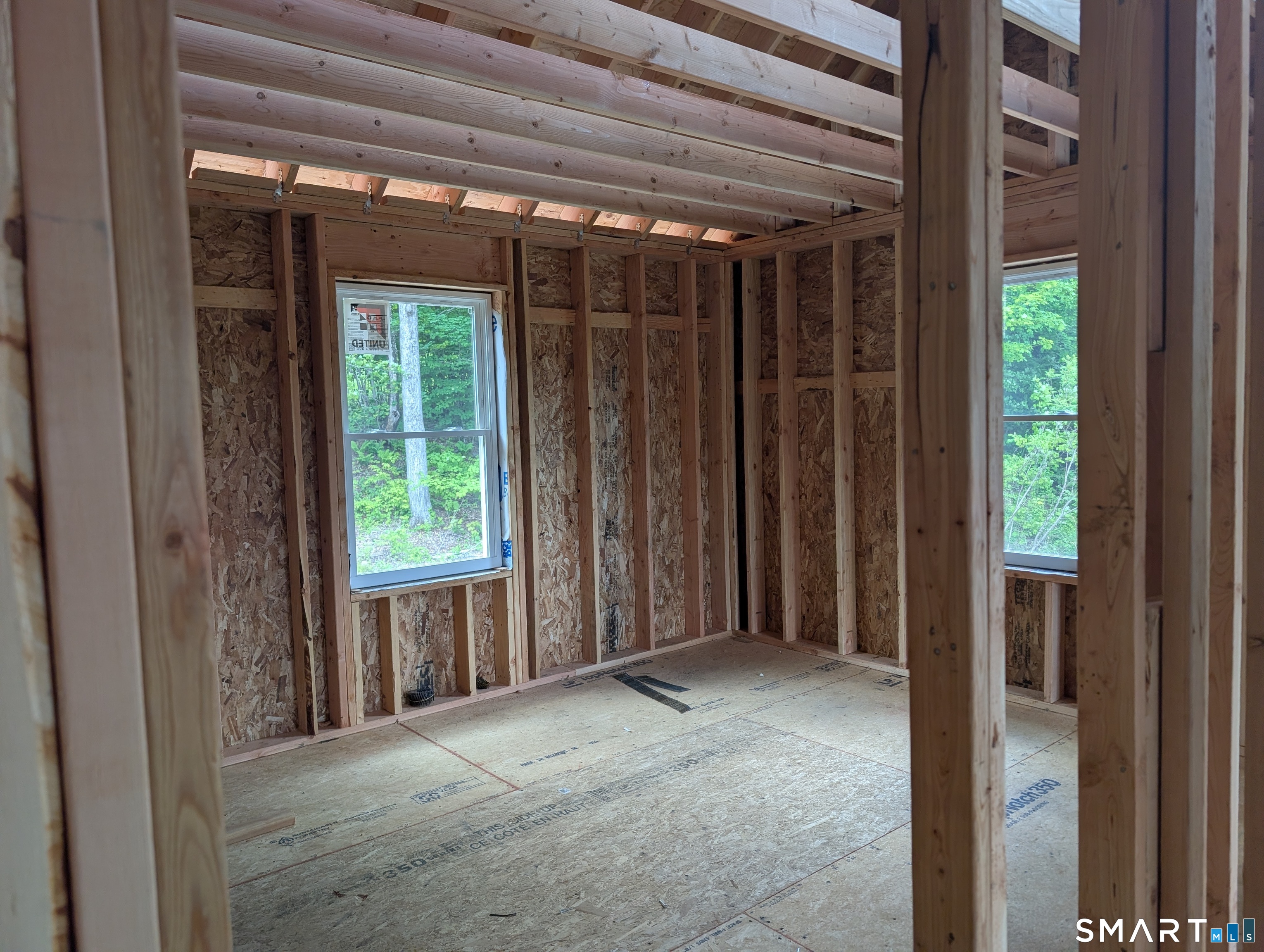 229 Wimbledon Gate North Torrington, CT 06790 - Photo 11 of 25 a view of an empty room with a window