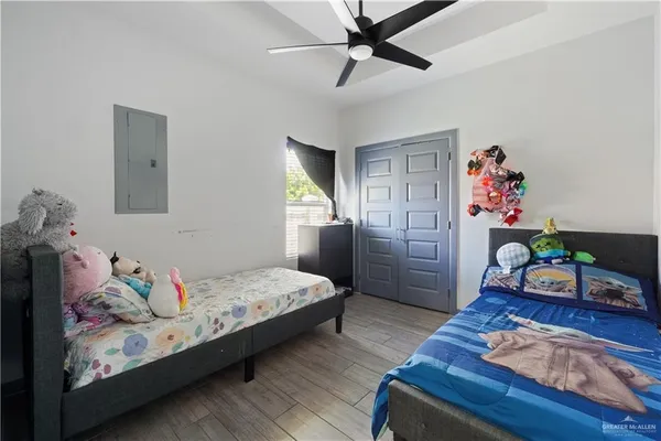 a bedroom with a bed and furniture