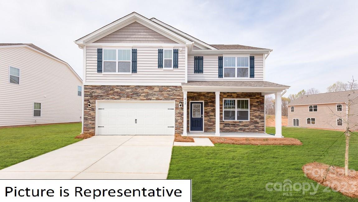 2147 Vanderlyn Street Monroe, NC 28112 - Photo 1 of 22 a front view of a house with a yard