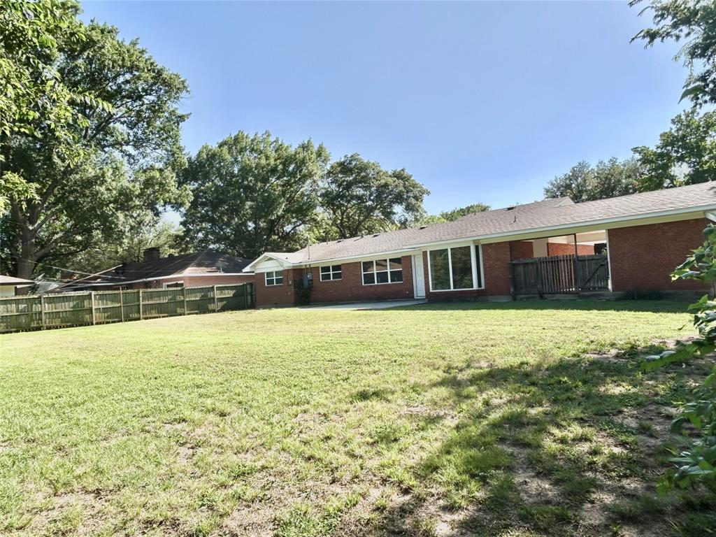 306 Line Drive Gainesville, TX 76240 - Photo 19 of 20 Side View of Backyard