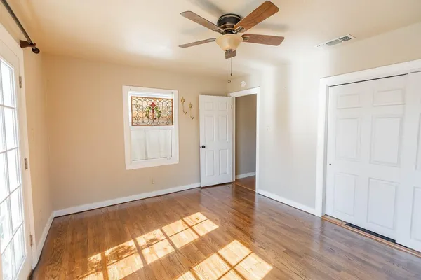 a view of an empty room and window