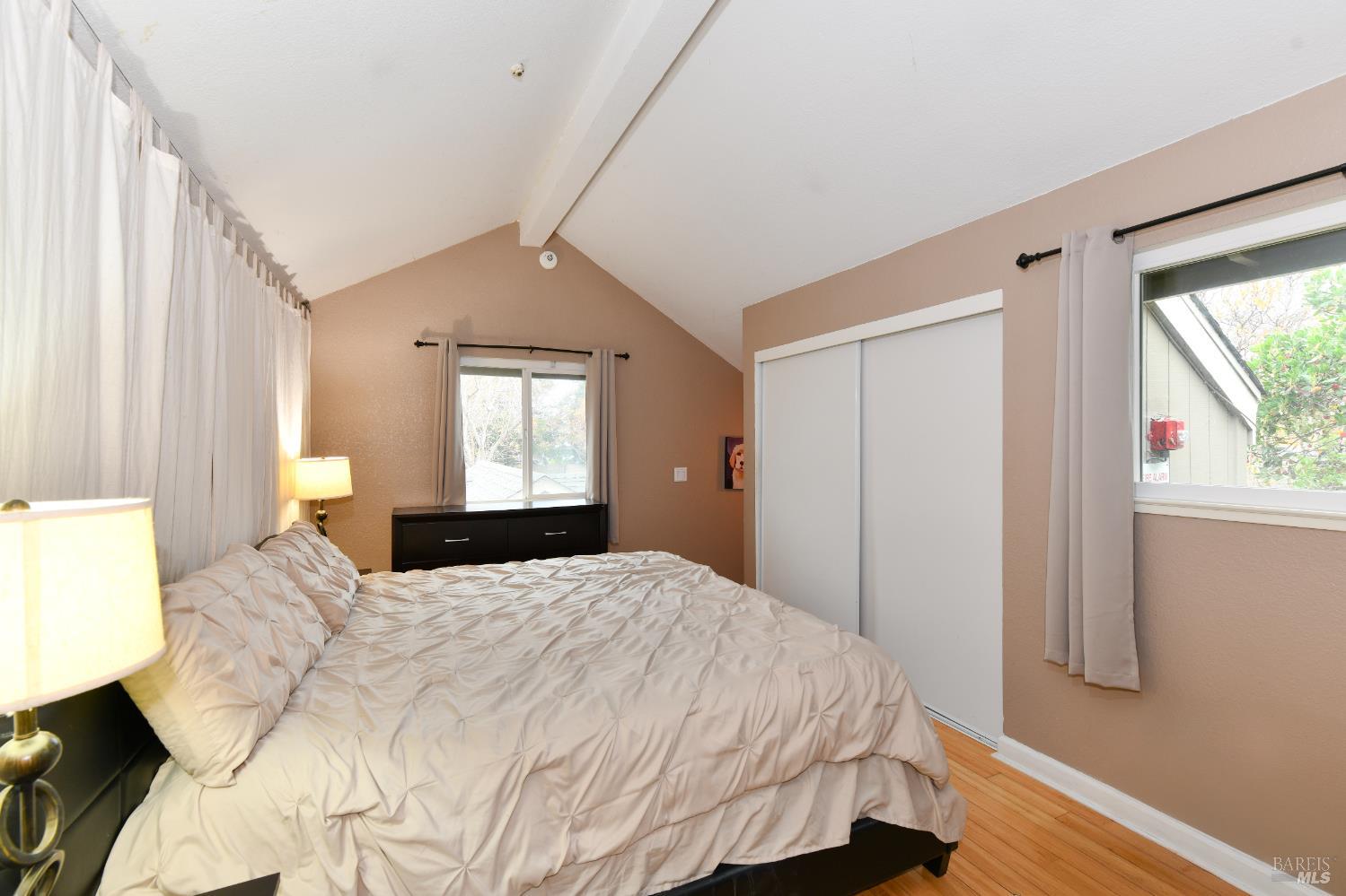 7755 Camino Colegio Rohnert Park, CA 94928 - Photo 13 of 26 a bedroom with a bed and a window