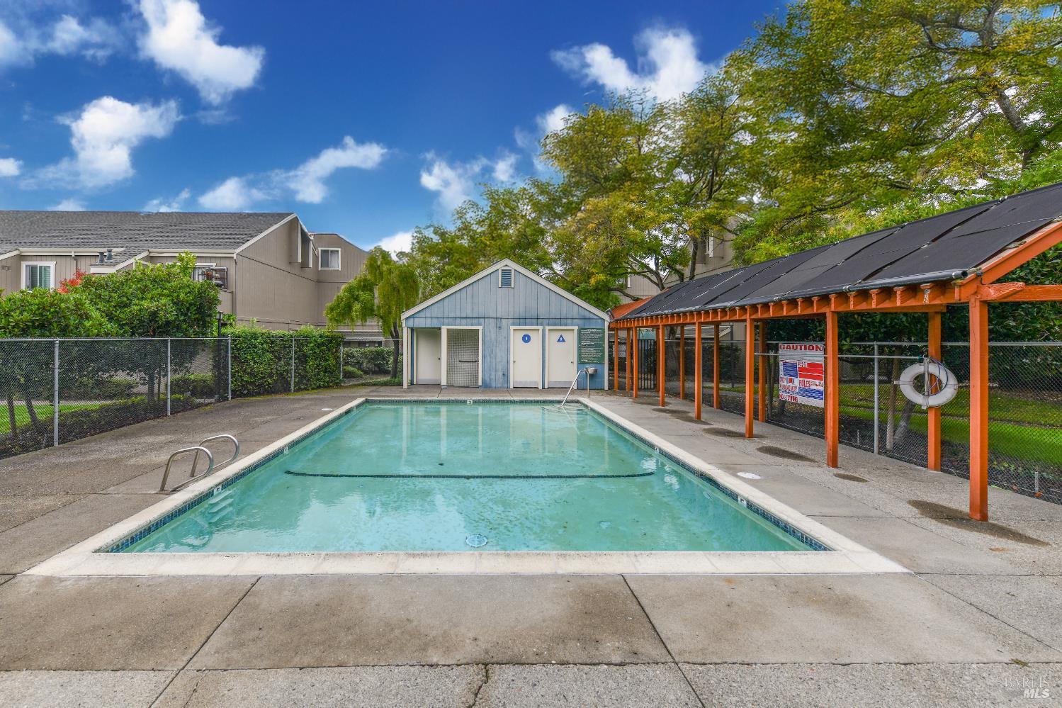 7755 Camino Colegio Rohnert Park, CA 94928 - Photo 23 of 26 a house with swimming pool in front of it
