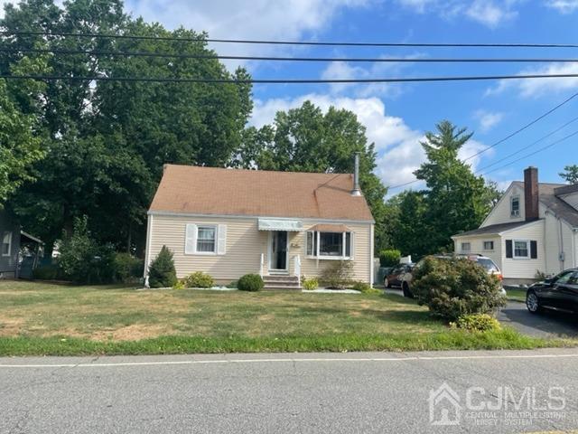 60 Lancaster Road Colonia, NJ 07067 - Photo 2 of 42 a front view of a house with a yard