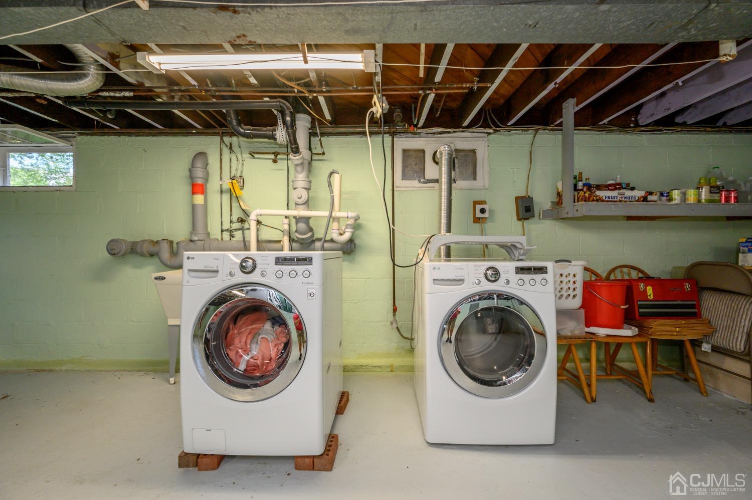 60 Lancaster Road Colonia, NJ 07067 - Photo 32 of 42 a utility room with dryer and washer