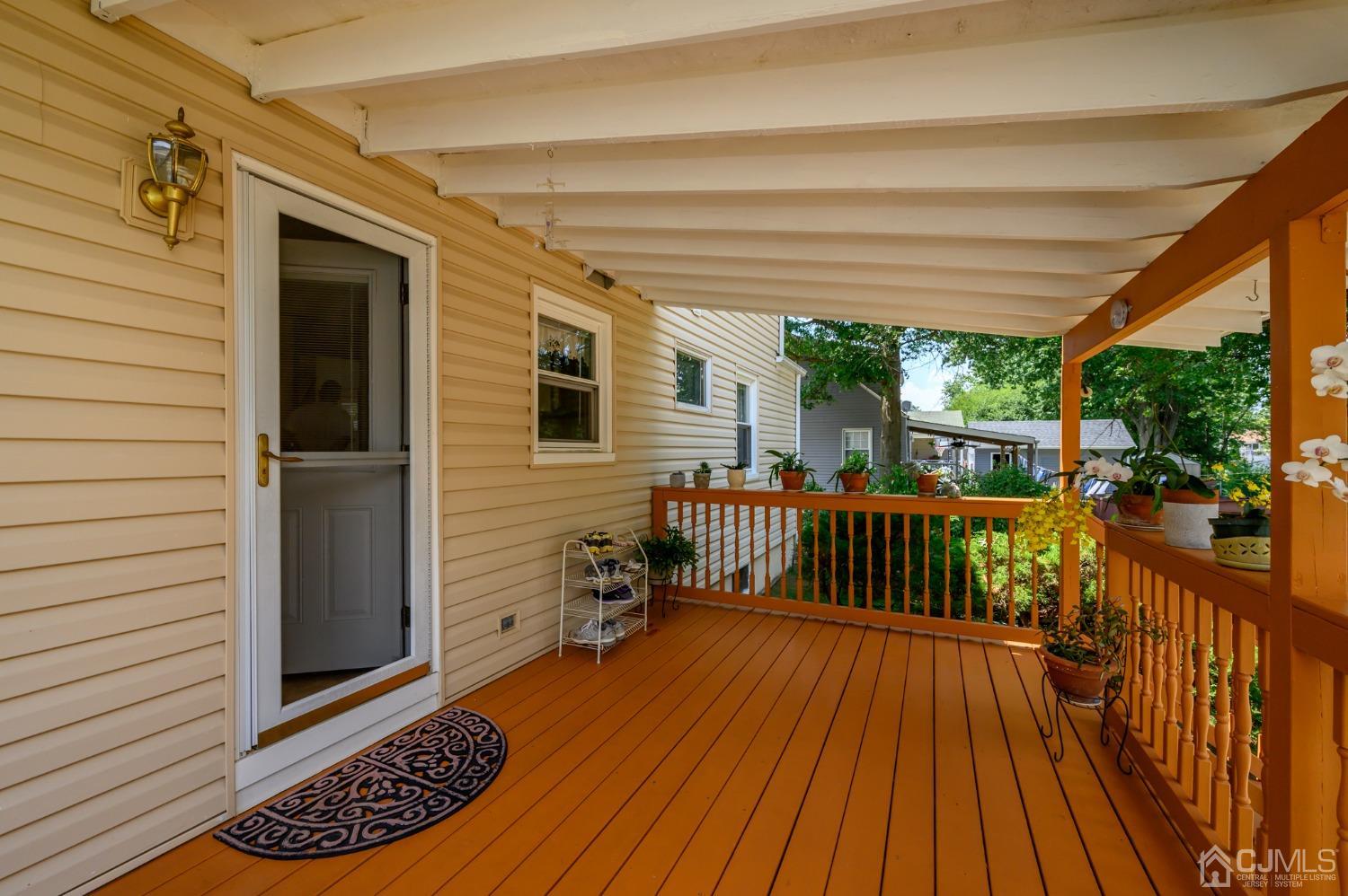 60 Lancaster Road Colonia, NJ 07067 - Photo 6 of 42 a view of balcony with wooden floor
