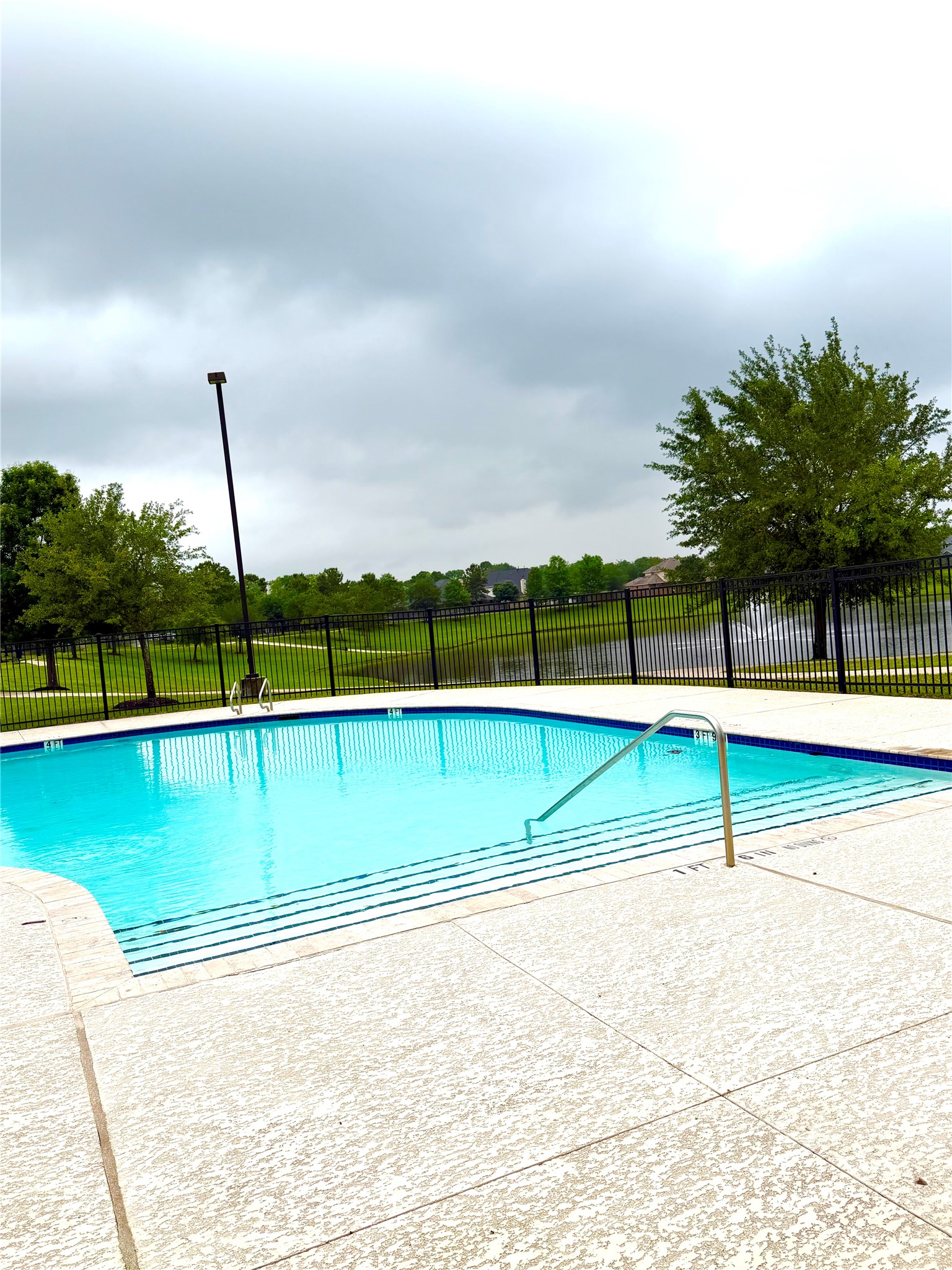 7046 Sliding Rock Circle Spring, TX 77379 - Photo 39 of 41 Enjoy sunny days and outdoor gatherings at your private community pool oasis.