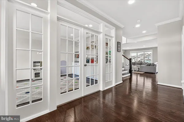 a bedroom with a bed and a potted plant