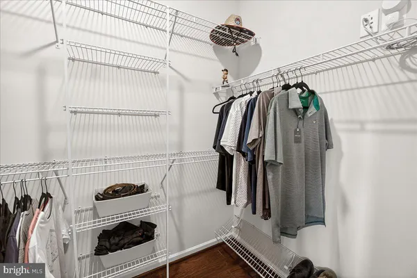a bathroom with a sink double vanity granite tub and shower
