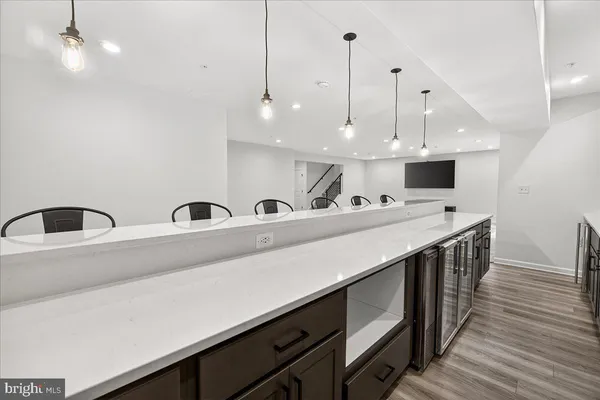 a front view of a house with a big yard