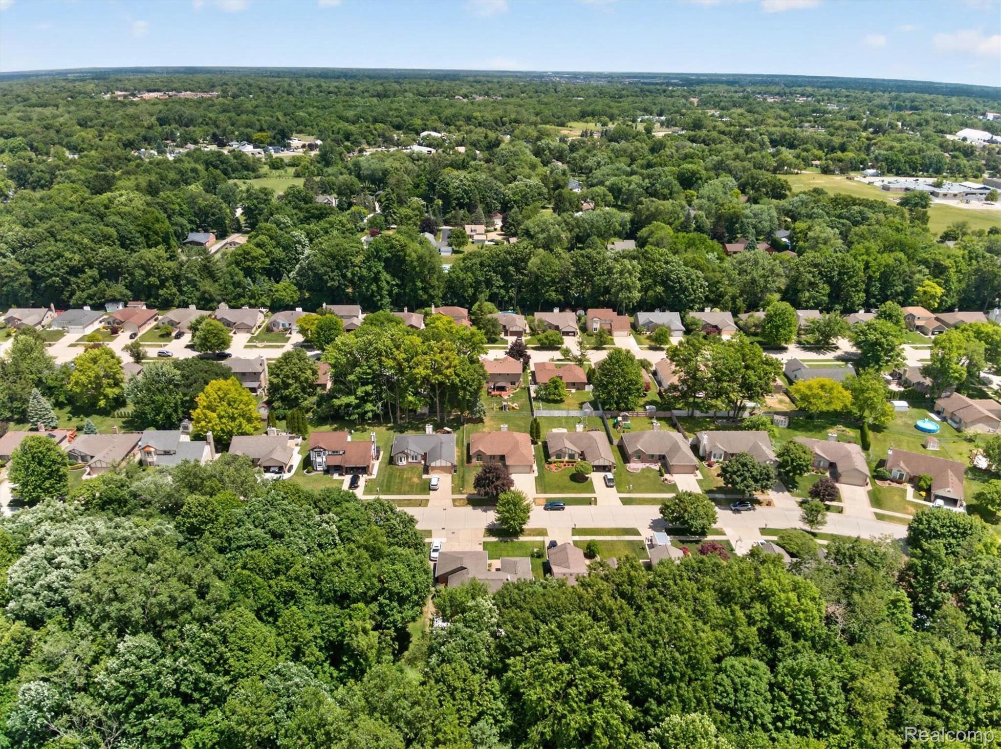 46362 Springhill Drive Utica, MI 48317 - Photo 58 of 59 Sprawling residential area surrounded by abundant mature trees and verdant landscapes