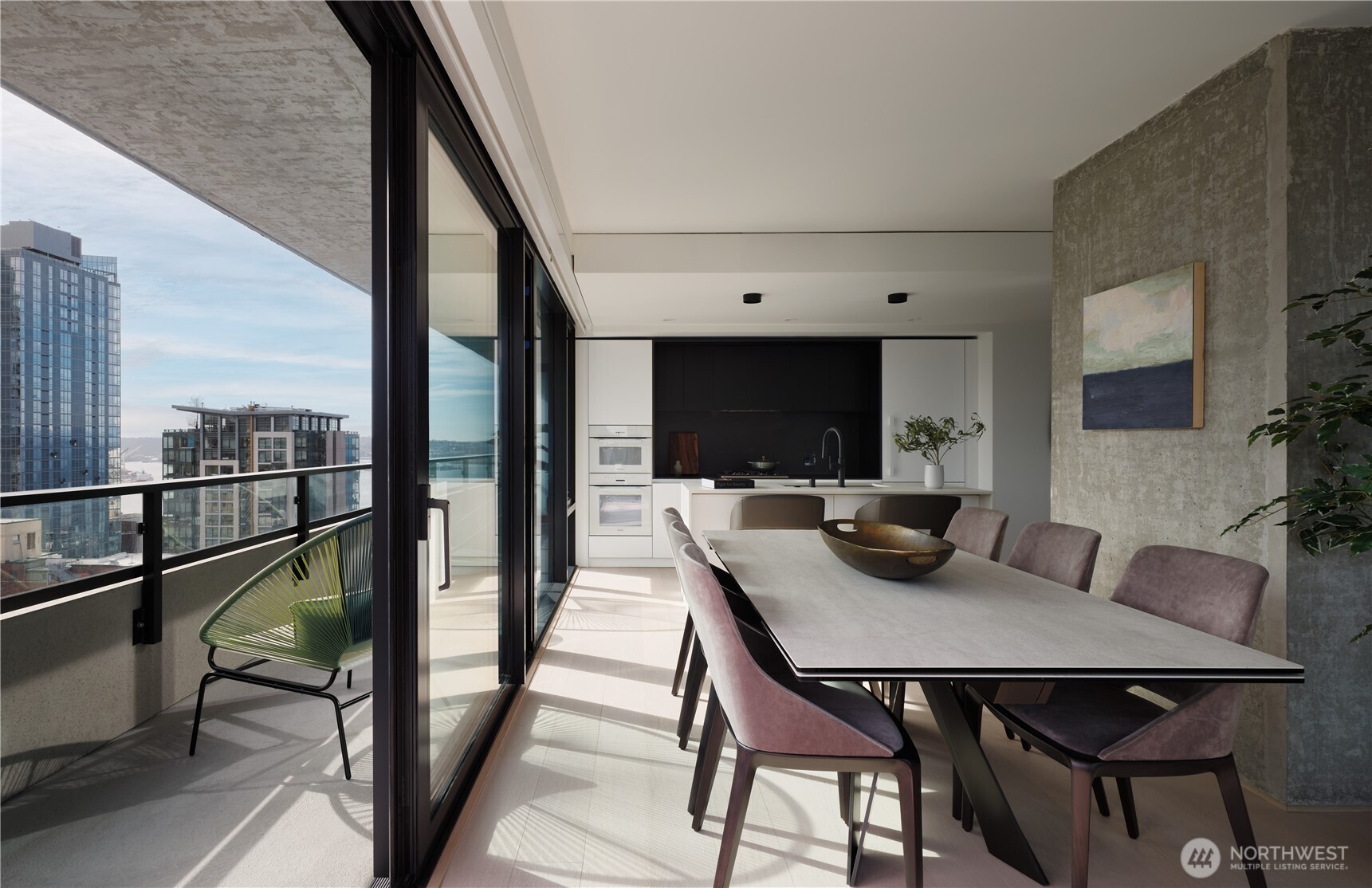 300 Virginia Street, Unit 4405 Seattle, WA 98101 - Photo 9 of 12 a view of a dining room with furniture window and wooden floor