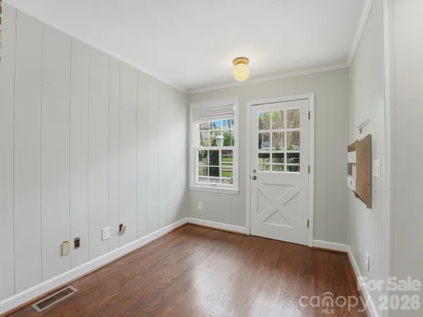 a bathroom with a shower and a sink