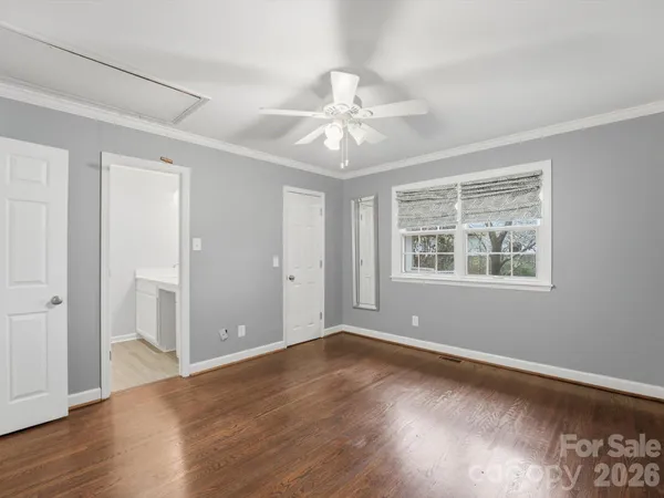 a view of room with wooden floor