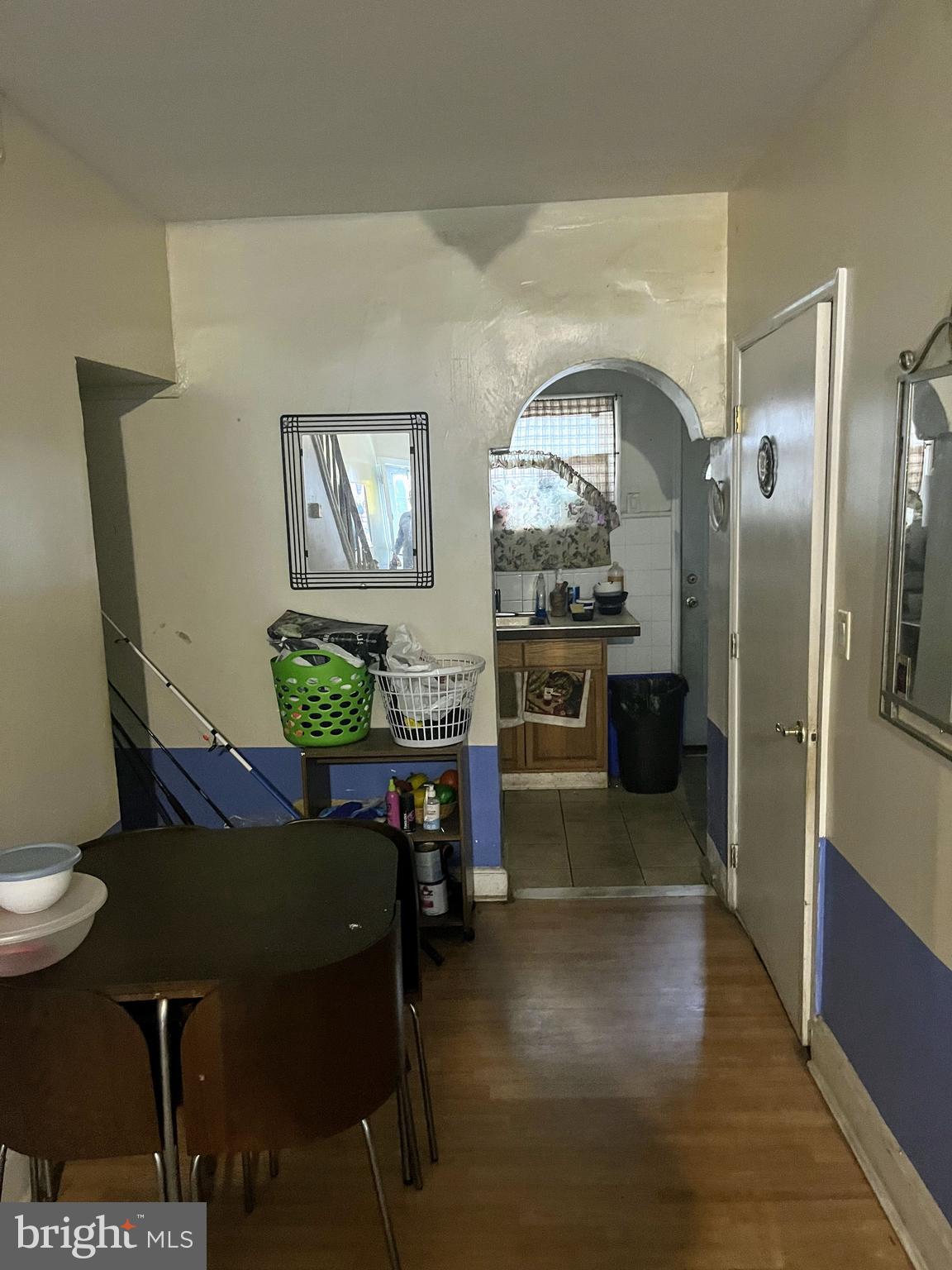 436 Hoffman Street Philadelphia, PA 19148 - Photo 3 of 9 a kitchen with stainless steel appliances granite countertop a refrigerator a stove a sink a dining table and chairs