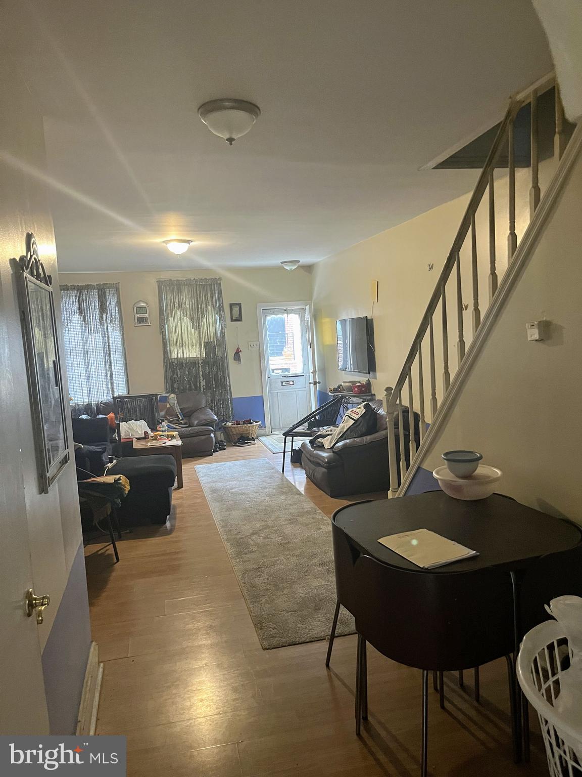 436 Hoffman Street Philadelphia, PA 19148 - Photo 5 of 9 a living room with furniture and a chandelier