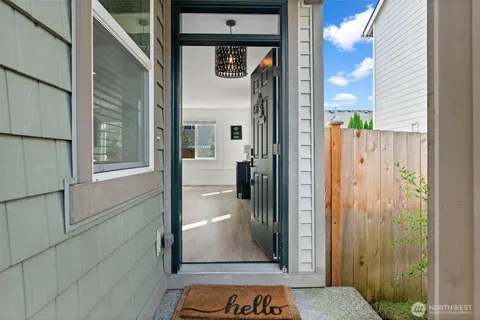 a view of entryway with wooden floor