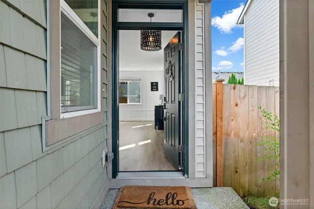 a view of entryway with wooden floor