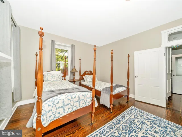 a view of a park with large trees