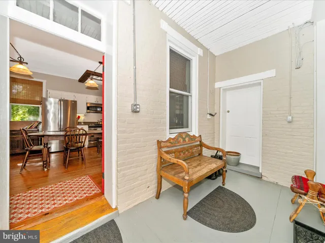 a house with swimming pool in front of it